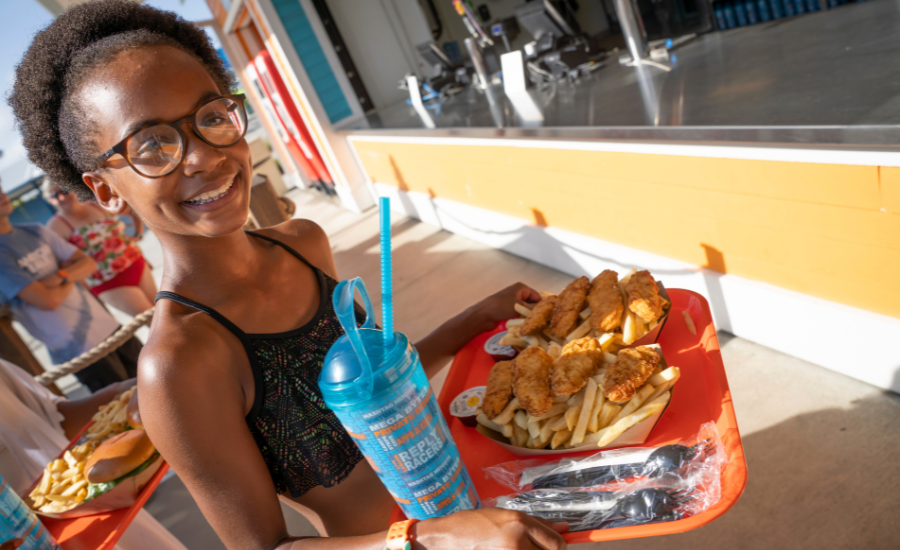 a girl getting ready to eat at island h20